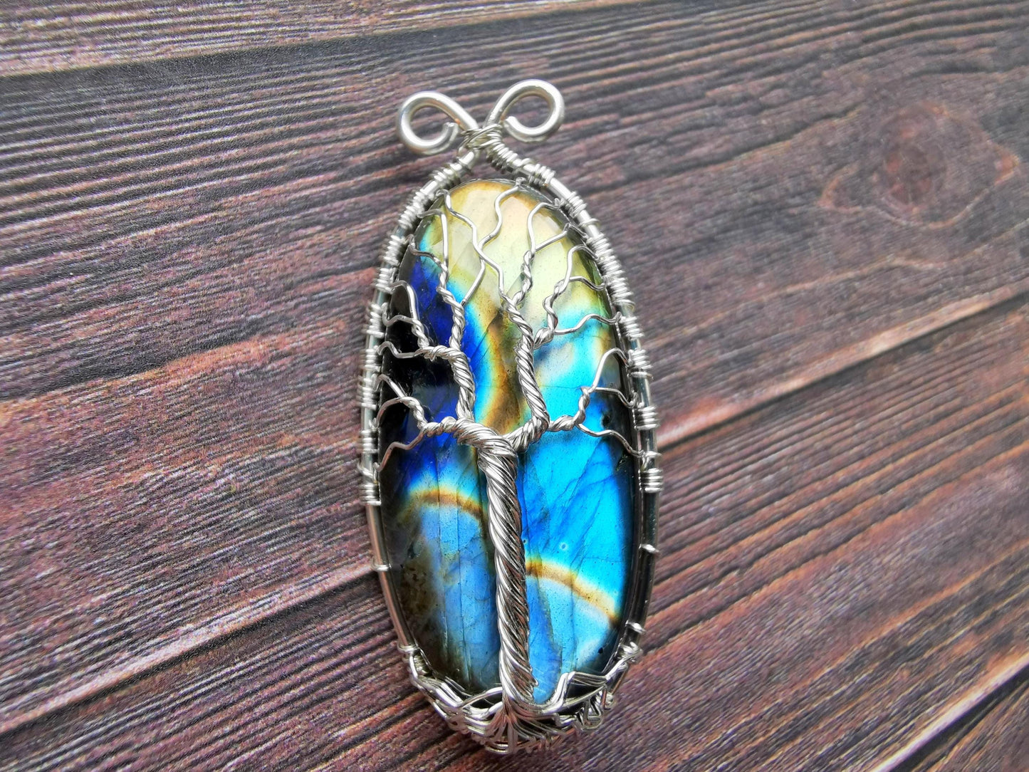 Tree brooch with a labradorite gemstone