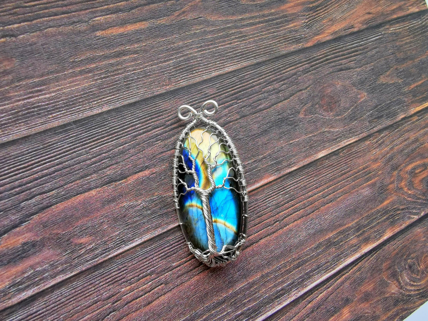 Tree brooch with a labradorite gemstone