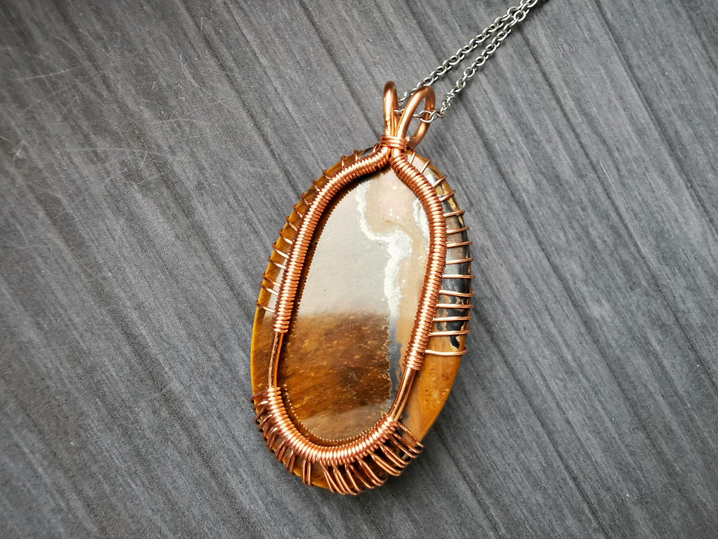 Tree pendant with a tiger's eye gemstone