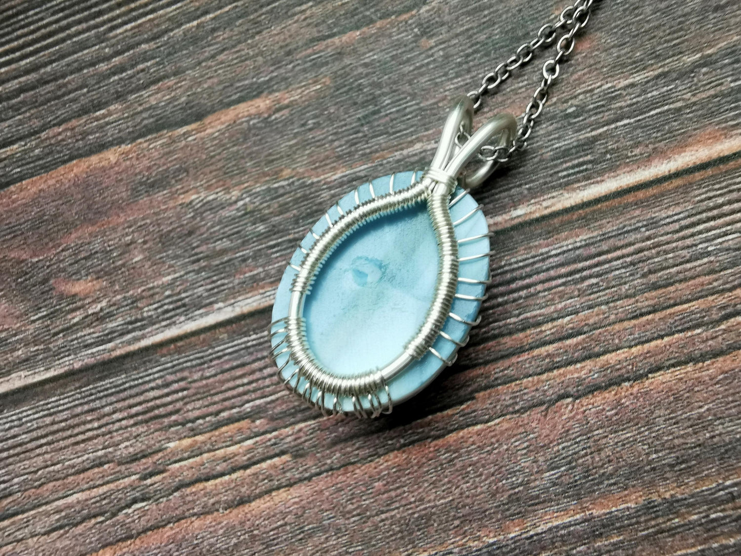 Tree pendant with a blue opal gemstone