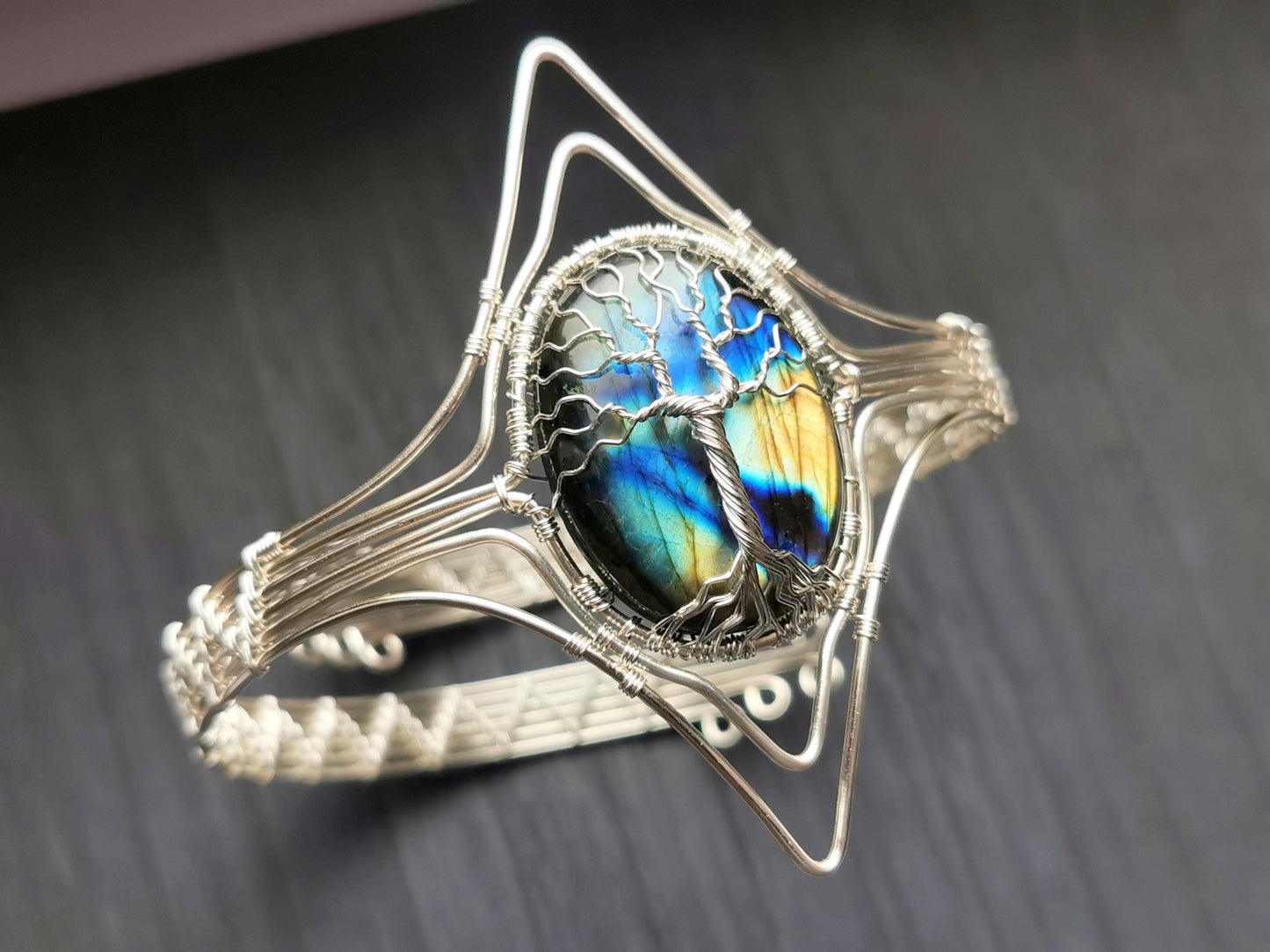 Tree arm ring with a labradorite gemstone
