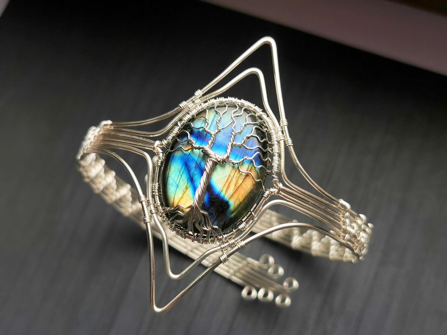 Tree arm ring with a labradorite gemstone