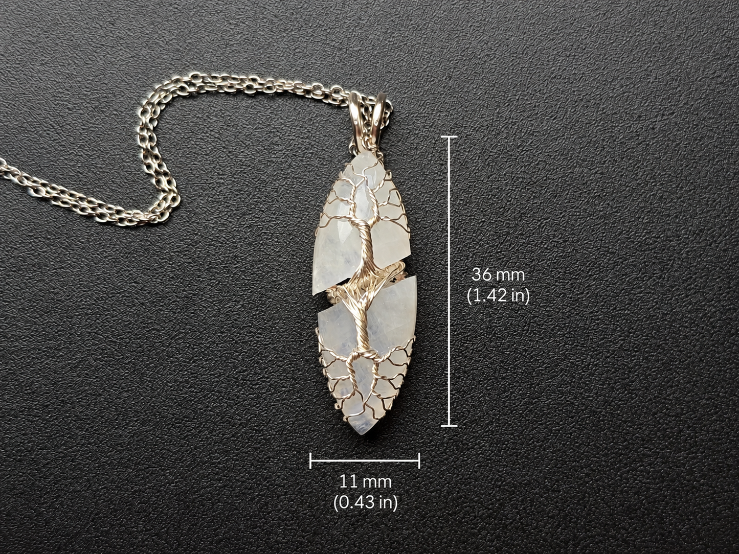Tree pendant with a broken moonstone